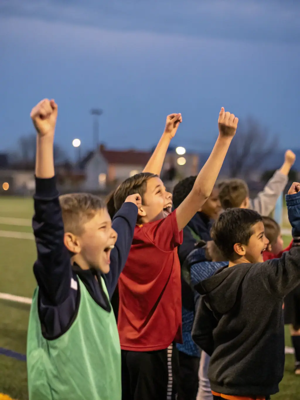 A photograph of Icons Sporting Football Academy players during an international tournament in the UK, highlighting their cultural exchange and global football exposure.