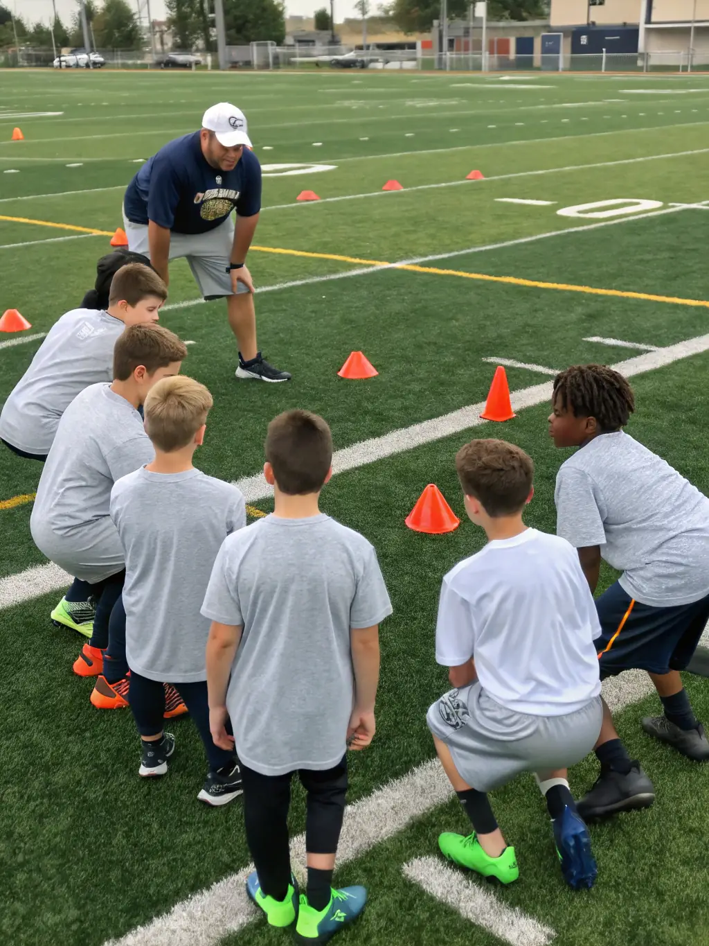 A dynamic image of older teenagers (U19 age group) participating in a specialized training session at Icons Sporting Football Academy, focusing on advanced techniques and strategies.